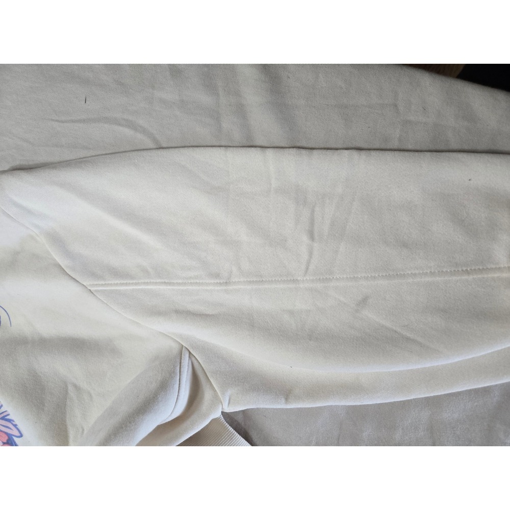 Wicked Movie Butterfly Pearl Graphic Sweatshirt Cream XXS 5UWT01OGLC NWT - Picture 9 of 10